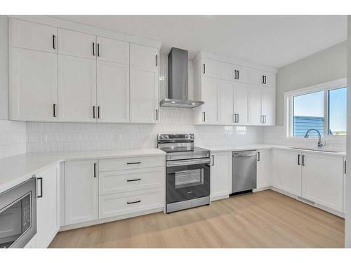 34 Lewiston Way, Calgary, AB - Indoor Photo Showing Kitchen With Upgraded Kitchen