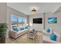 34 Lewiston Way, Calgary, AB  - Indoor Photo Showing Living Room 