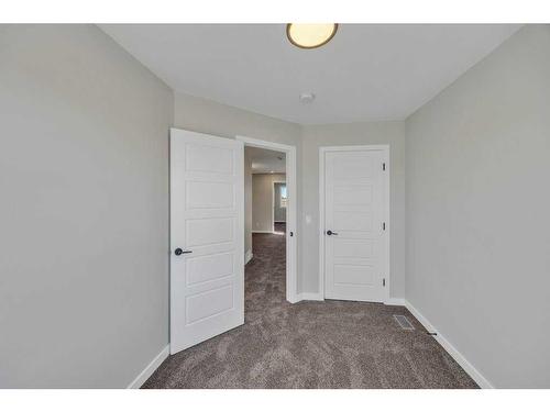 34 Lewiston Way, Calgary, AB - Indoor Photo Showing Other Room