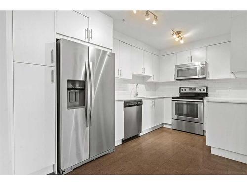 1103-302 Skyview Ranch Drive Ne, Calgary, AB - Indoor Photo Showing Kitchen With Stainless Steel Kitchen With Upgraded Kitchen