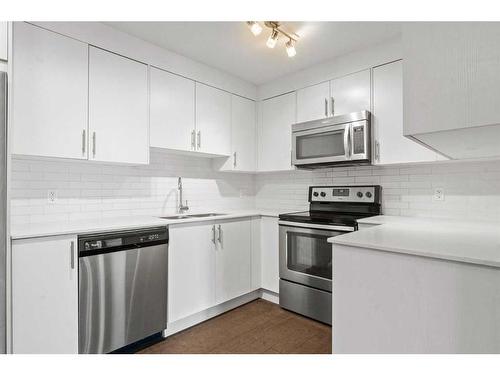 1103-302 Skyview Ranch Drive Ne, Calgary, AB - Indoor Photo Showing Kitchen With Stainless Steel Kitchen With Upgraded Kitchen