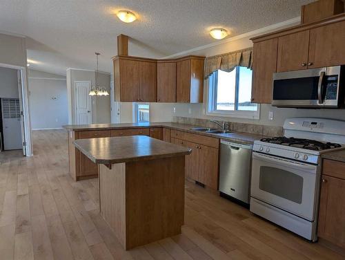 33525 Range Road 41, Rural Mountain View County, AB - Indoor Photo Showing Kitchen With Double Sink