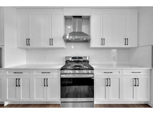 51 Heritage Circle, Cochrane, AB - Indoor Photo Showing Kitchen