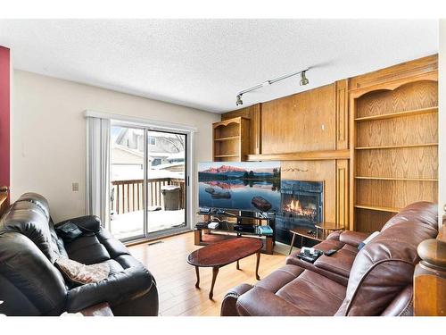 6556 Martingrove Drive Ne, Calgary, AB - Indoor Photo Showing Living Room With Fireplace