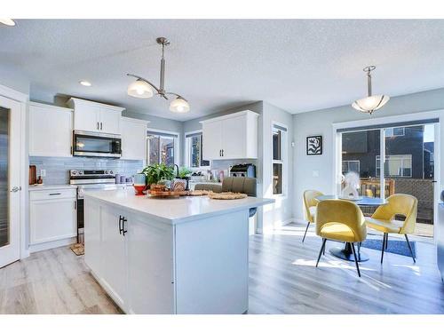 1715 Baywater View Sw, Airdrie, AB - Indoor Photo Showing Kitchen With Upgraded Kitchen