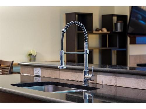 104-41 6A Street Ne, Calgary, AB - Indoor Photo Showing Kitchen With Double Sink