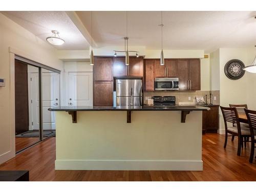 104-41 6A Street Ne, Calgary, AB - Indoor Photo Showing Kitchen With Upgraded Kitchen