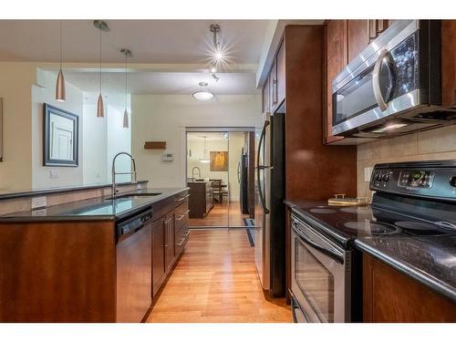 104-41 6A Street Ne, Calgary, AB - Indoor Photo Showing Kitchen With Upgraded Kitchen