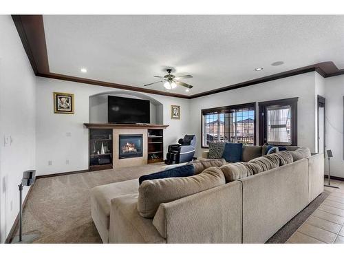 22 Taralake Cape Ne, Calgary, AB - Indoor Photo Showing Living Room With Fireplace