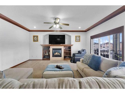 22 Taralake Cape Ne, Calgary, AB - Indoor Photo Showing Living Room With Fireplace