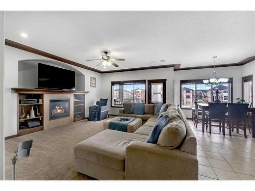 22 Taralake Cape Ne, Calgary, AB - Indoor Photo Showing Living Room With Fireplace