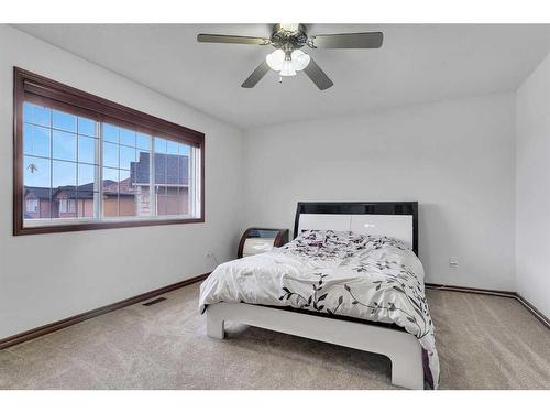 22 Taralake Cape Ne, Calgary, AB - Indoor Photo Showing Bedroom