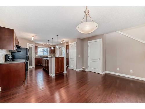 179 Silverado Drive Sw, Calgary, AB - Indoor Photo Showing Kitchen With Double Sink