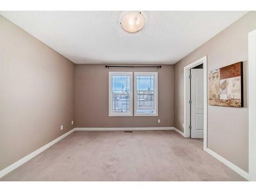 179 Silverado Drive Sw, Calgary, AB - Indoor Photo Showing Other Room