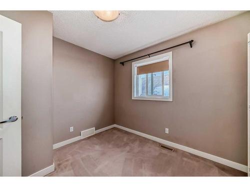 179 Silverado Drive Sw, Calgary, AB - Indoor Photo Showing Other Room