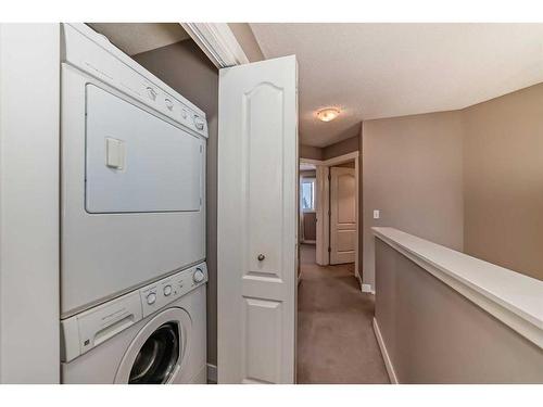 179 Silverado Drive Sw, Calgary, AB - Indoor Photo Showing Laundry Room