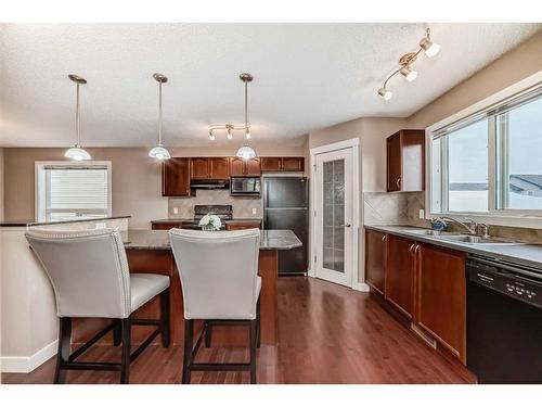 179 Silverado Drive Sw, Calgary, AB - Indoor Photo Showing Kitchen With Double Sink