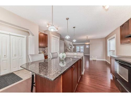 179 Silverado Drive Sw, Calgary, AB - Indoor Photo Showing Kitchen With Upgraded Kitchen