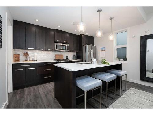 1-3716 16 Street Sw, Calgary, AB - Indoor Photo Showing Kitchen With Stainless Steel Kitchen With Upgraded Kitchen