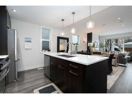 1-3716 16 Street Sw, Calgary, AB - Indoor Photo Showing Kitchen With Double Sink With Upgraded Kitchen