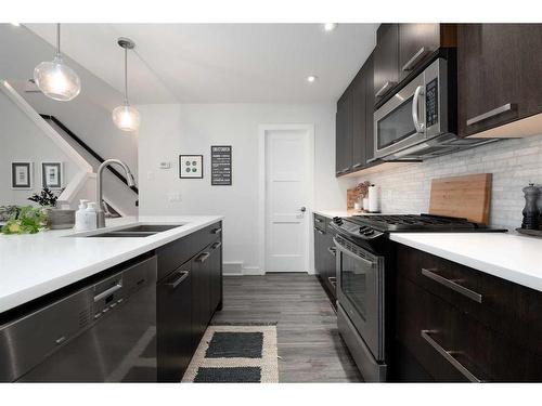 1-3716 16 Street Sw, Calgary, AB - Indoor Photo Showing Kitchen With Double Sink