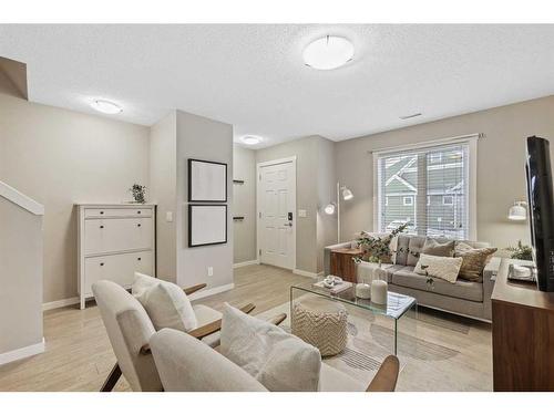 310 Mckenzie Towne Close Se, Calgary, AB - Indoor Photo Showing Living Room