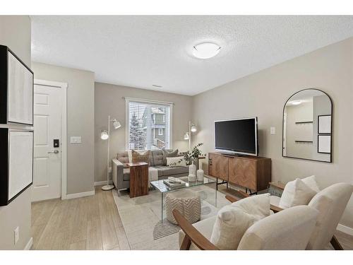 310 Mckenzie Towne Close Se, Calgary, AB - Indoor Photo Showing Living Room