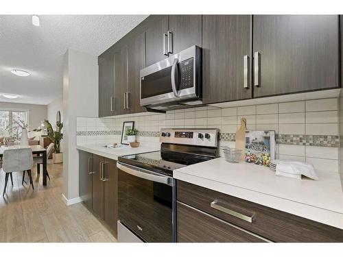 310 Mckenzie Towne Close Se, Calgary, AB - Indoor Photo Showing Kitchen With Upgraded Kitchen