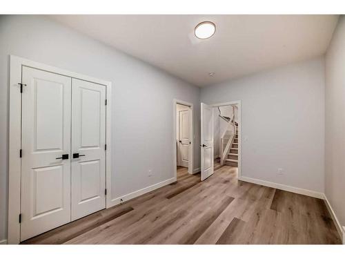 492 Rivercrest View, Cochrane, AB - Indoor Photo Showing Other Room