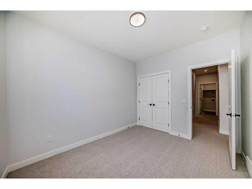 492 Rivercrest View, Cochrane, AB - Indoor Photo Showing Other Room