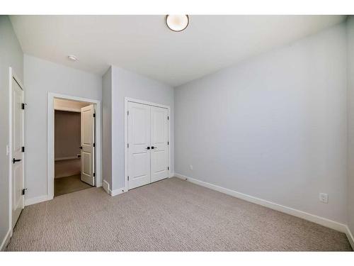 492 Rivercrest View, Cochrane, AB - Indoor Photo Showing Other Room