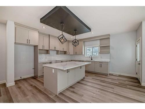 492 Rivercrest View, Cochrane, AB - Indoor Photo Showing Kitchen