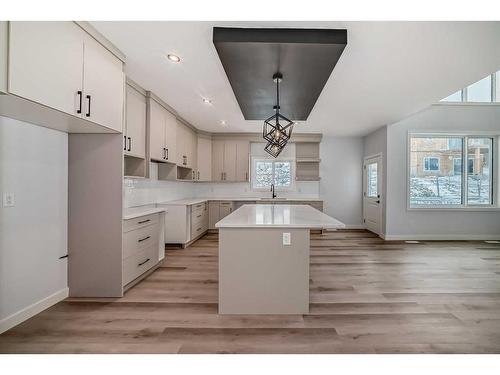 492 Rivercrest View, Cochrane, AB - Indoor Photo Showing Kitchen With Upgraded Kitchen