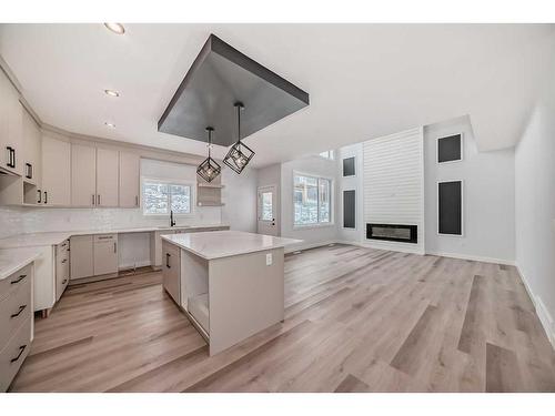 492 Rivercrest View, Cochrane, AB - Indoor Photo Showing Kitchen