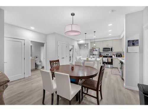 305-150 Shawnee Square Sw, Calgary, AB - Indoor Photo Showing Dining Room