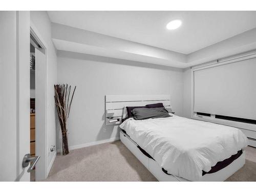 305-150 Shawnee Square Sw, Calgary, AB - Indoor Photo Showing Bedroom