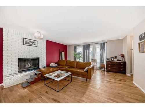 8316 46 Avenue Nw, Calgary, AB - Indoor Photo Showing Living Room With Fireplace