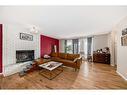 8316 46 Avenue Nw, Calgary, AB  - Indoor Photo Showing Living Room With Fireplace 