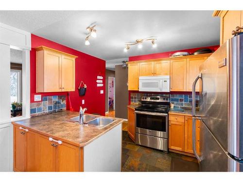 5 Mcleod Crescent, Olds, AB - Indoor Photo Showing Kitchen With Double Sink