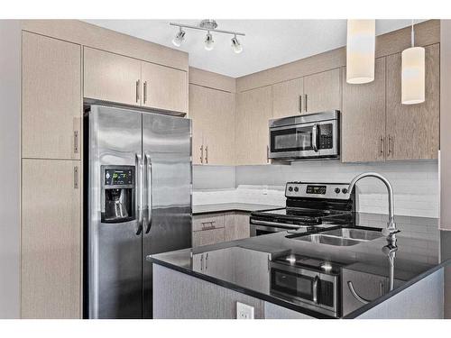 2308-240 Skyview Ranch Road Ne, Calgary, AB - Indoor Photo Showing Kitchen With Stainless Steel Kitchen With Double Sink With Upgraded Kitchen