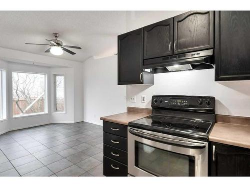 80 Rivercrest Crescent Se, Calgary, AB - Indoor Photo Showing Kitchen