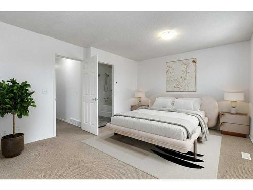 80 Rivercrest Crescent Se, Calgary, AB - Indoor Photo Showing Bedroom