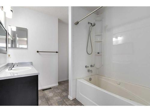 80 Rivercrest Crescent Se, Calgary, AB - Indoor Photo Showing Bathroom