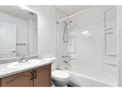 80 Rivercrest Crescent Se, Calgary, AB - Indoor Photo Showing Bathroom