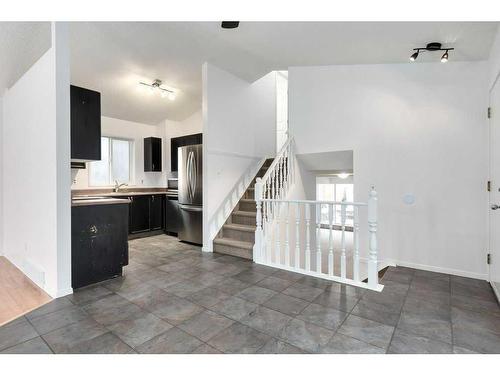 80 Rivercrest Crescent Se, Calgary, AB - Indoor Photo Showing Kitchen