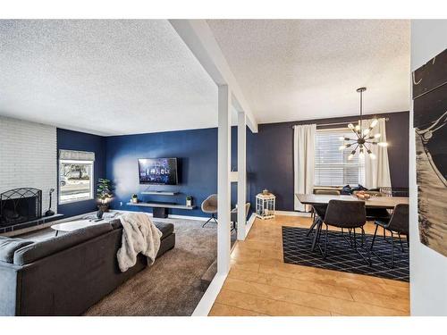 739 Queensland Drive Se, Calgary, AB - Indoor Photo Showing Living Room