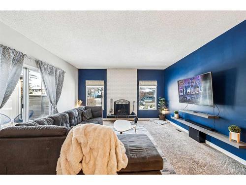 739 Queensland Drive Se, Calgary, AB - Indoor Photo Showing Living Room