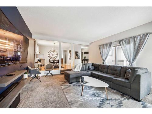 739 Queensland Drive Se, Calgary, AB - Indoor Photo Showing Living Room