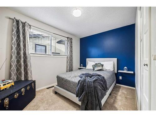 739 Queensland Drive Se, Calgary, AB - Indoor Photo Showing Bedroom