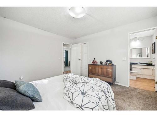 739 Queensland Drive Se, Calgary, AB - Indoor Photo Showing Bedroom